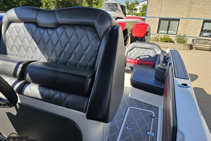 Slide: The Image of 2020 Sunsation 32 CCX boat interior with diamond-stitched seating and modern design. - 125