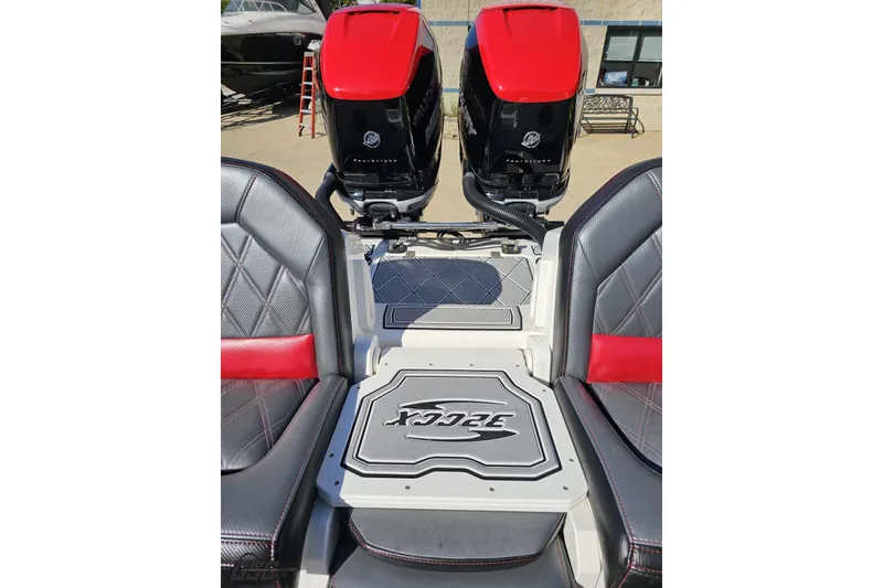 Slide: The Image of 2020 Sunsation 32 CCX boat interior with dual outboard engines and stylish seating. - 129