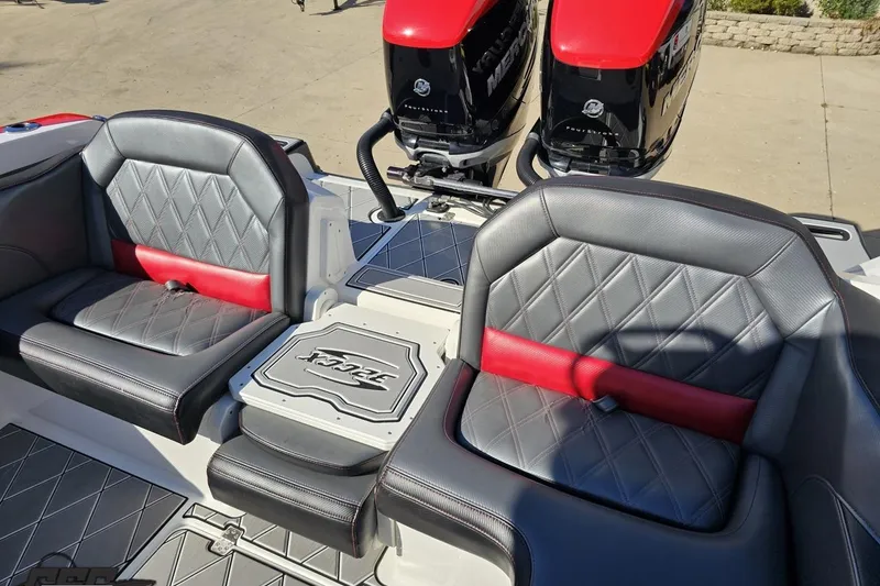 Slide: The Image of 2020 Sunsation 32 CCX boat interior with diamond-stitched seats and dual Mercury engines. - 130