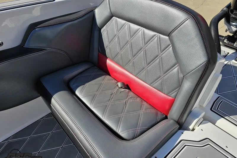 Slide: The Image of 2020 Sunsation 32 CCX boat seat with diamond-stitched black and red upholstery. - 131
