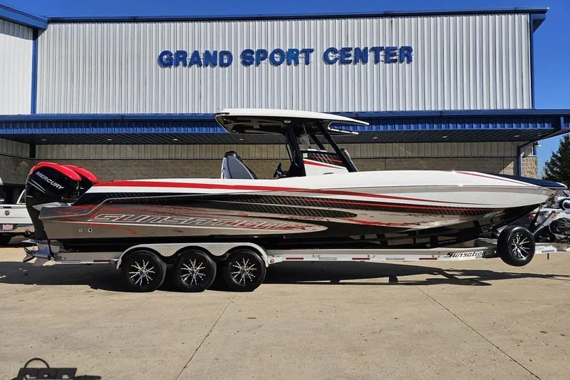 Slide: The Image of 2020 Sunsation 32 CCX boat on trailer at Grand Sport Center. - 2