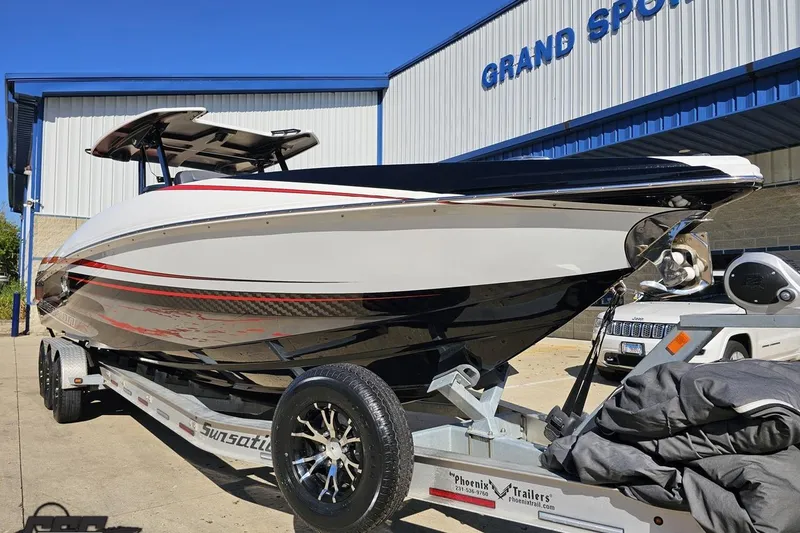 Slide: The Image of 2020 Sunsation 32 CCX boat on trailer at Grand Sport facility. - 21