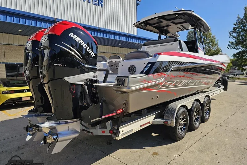 Slide: The Image of 2020 Sunsation 32 CCX boat with dual Mercury Verado engines on a trailer. - 41