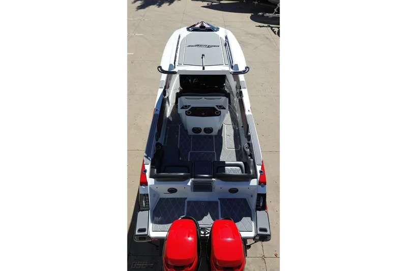 Slide: The Image of 2020 Sunsation 32 CCX boat, aerial view, featuring sleek design and dual red engines. - 45
