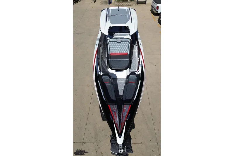 Slide: The Image of 2020 Sunsation 32 CCX boat, aerial view, sleek design with red and black accents. - 48