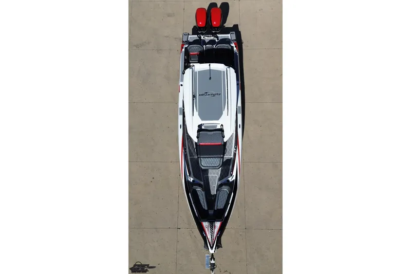 Slide: The Image of 2020 Sunsation 32 CCX boat, aerial view, sleek design, red and black accents. - 49