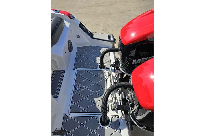 Slide: The Image of 2020 Sunsation 32 CCX boat deck with red Mercury engines and diamond-pattern flooring. - 51