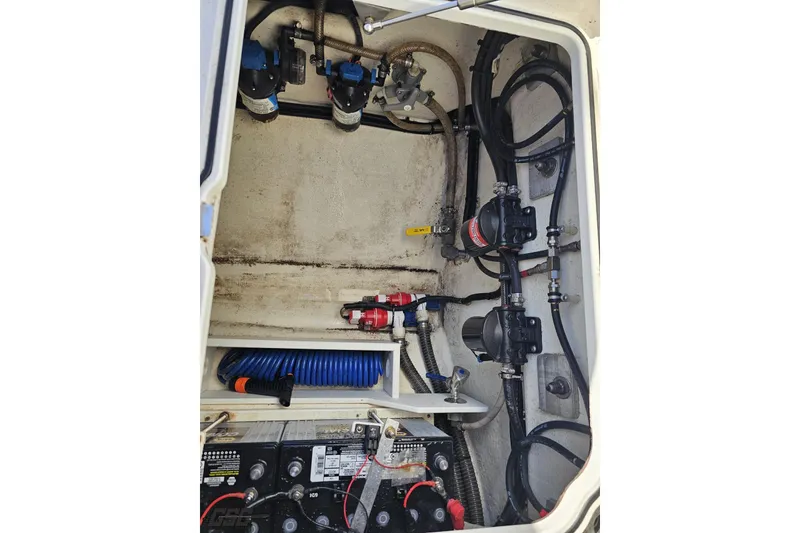 Slide: The Image of 2020 Sunsation 32 CCX engine compartment with wiring and components. - 52