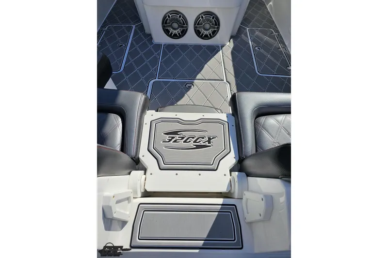 Slide: The Image of 2020 Sunsation 32 CCX boat interior with custom flooring and seating. - 57