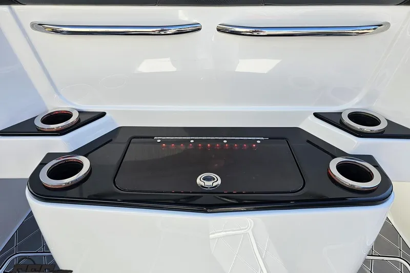 Slide: The Image of 2020 Sunsation 32 CCX boat interior with sleek cup holders and modern design. - 62