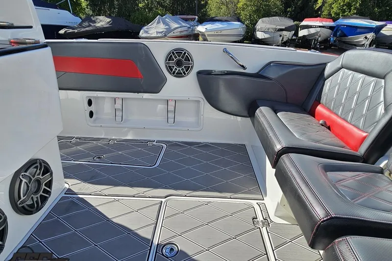 Slide: The Image of 2020 Sunsation 32 CCX boat interior with stylish seating and modern speaker system. - 65