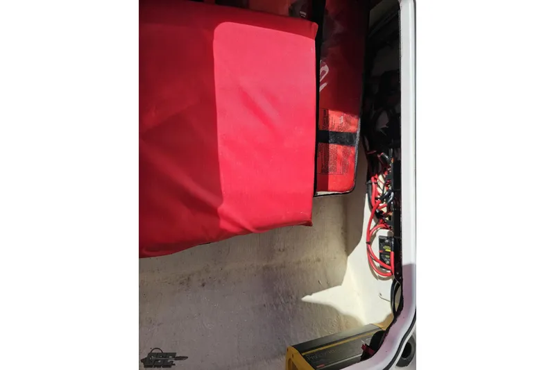 Slide: The Image of Interior view of 2020 Sunsation 32 CCX boat with red equipment and wiring. - 67