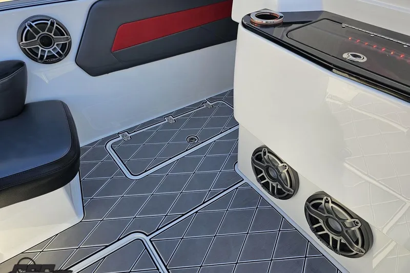 Slide: The Image of 2020 Sunsation 32 CCX boat interior with speakers and stylish flooring. - 70
