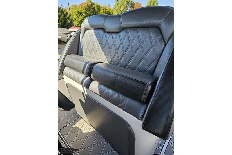 Slide: The Image of 2020 Sunsation 32 CCX boat seat with diamond-stitched black leather upholstery. - 77