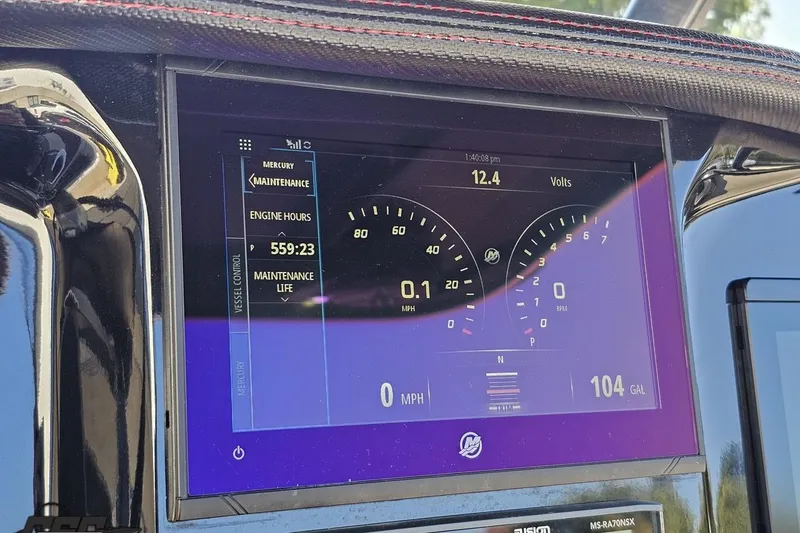 Slide: The Image of Dashboard of 2020 Sunsation 32 CCX showing engine hours and maintenance details. - 82
