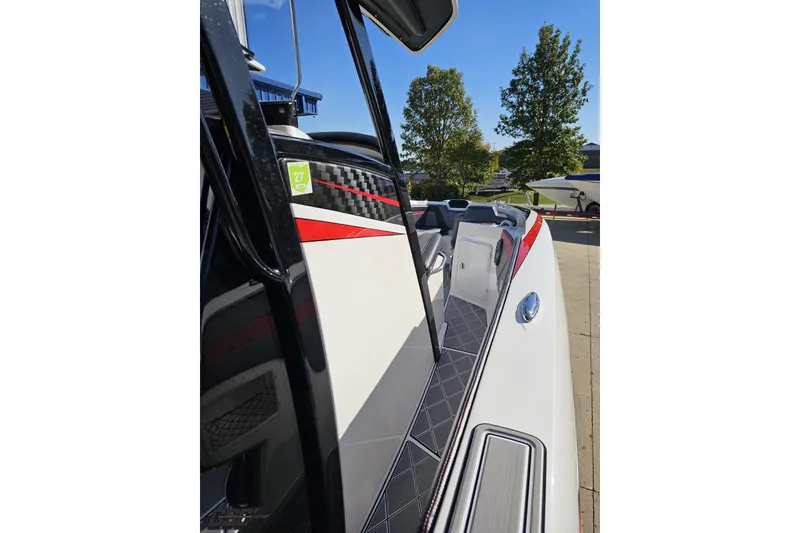 Slide: The Image of 2020 Sunsation 32 CCX boat with sleek design and modern detailing. - 87