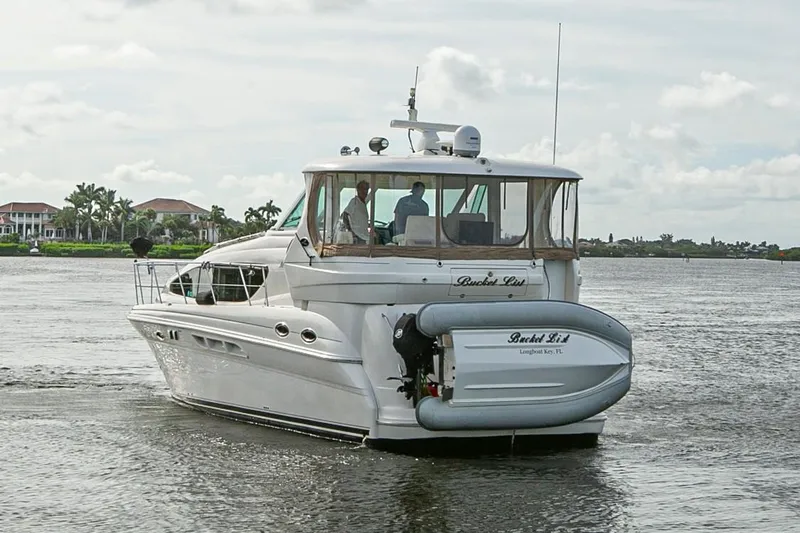 Slide: The Image of 2006 Sea Ray 40 Motor Yacht helm with advanced navigation and control systems. - 16