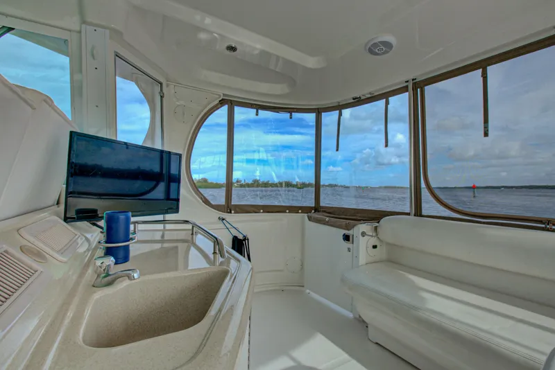Slide: The Image of Interior cabin of 2006 Sea Ray 40 Motor Yacht with cozy bed and ambient lighting. - 29