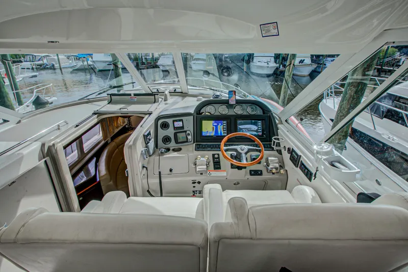 Slide: The Image of Luxurious interior of 2006 Sea Ray 40 Motor Yacht with leather seating and decorative pillow. - 40