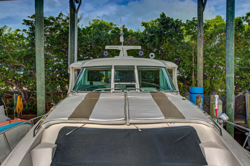 Slide: The Image of Interior cabin of 2006 Sea Ray 40 Motor Yacht with cozy seating and storage. - 41