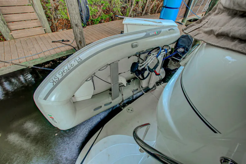 Slide: The Image of Luxurious interior of 2006 Sea Ray 40 Motor Yacht with leather seating and elegant table. - 45