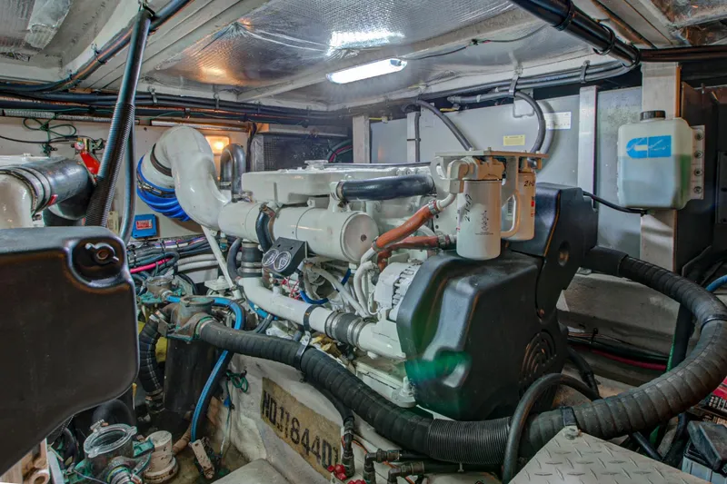 Slide: The Image of 2006 Sea Ray 40 Motor Yacht kitchen with wood cabinets and granite countertop. - 47