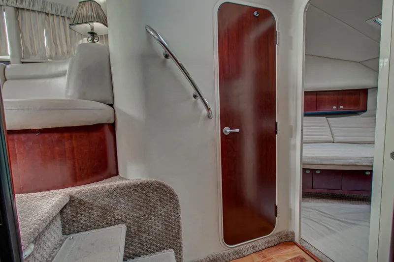 Slide: The Image of Engine compartment of a 2006 Sea Ray 40 Motor Yacht, showcasing detailed components. - 52