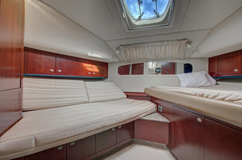 Slide: The Image of Engine compartment of a 2006 Sea Ray 40 Motor Yacht, showcasing detailed components. - 55