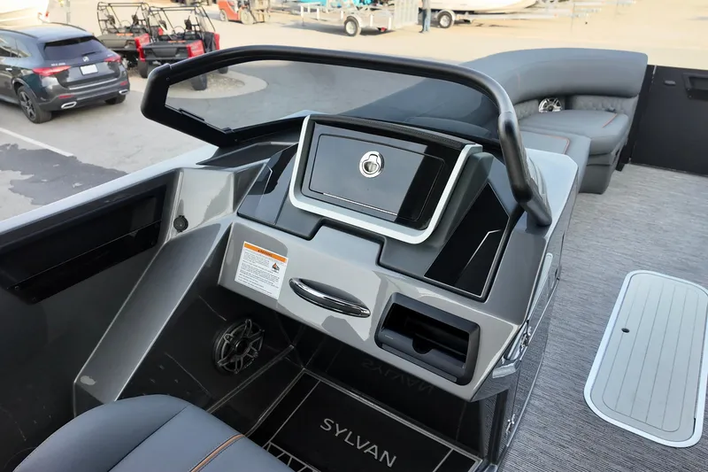 Slide: The Image of 2026 Sylvan M-5 CLZ DC boat dashboard with modern controls and seating. - 12