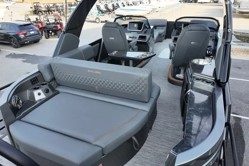 Slide: The Image of 2026 Sylvan M-5 CLZ DC boat interior with luxurious seating and modern amenities. - 20