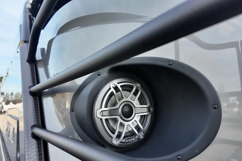 Slide: The Image of Close-up of a JL Audio speaker on a 2026 Sylvan M-5 CLZ DC boat. - 23