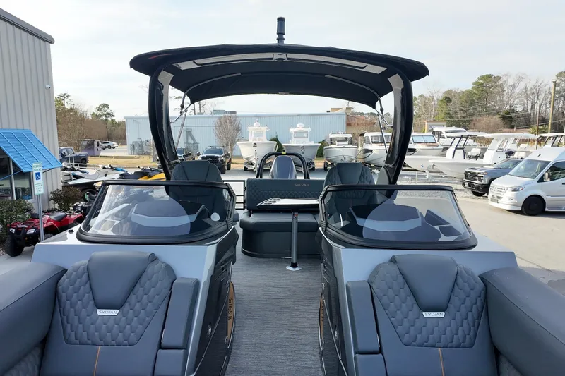 Slide: The Image of 2026 Sylvan M-5 CLZ DC luxury boat with sleek design and modern features. - 4