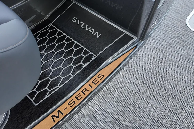 Slide: The Image of 2026 Sylvan M-5 CLZ DC interior with branded floor mat and M-Series label. - 5