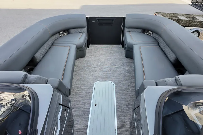 Slide: The Image of Luxurious interior of 2026 Sylvan M-5 CLZ DC pontoon boat with plush seating. - 9