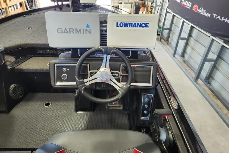 Slide: The Image of 2022 Ranger Z520R boat dashboard with Garmin and Lowrance displays. - 6