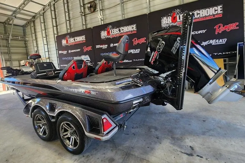 Slide: The Image of 2022 Ranger Z520R boat in showroom, featuring sleek design and powerful engine. - 7