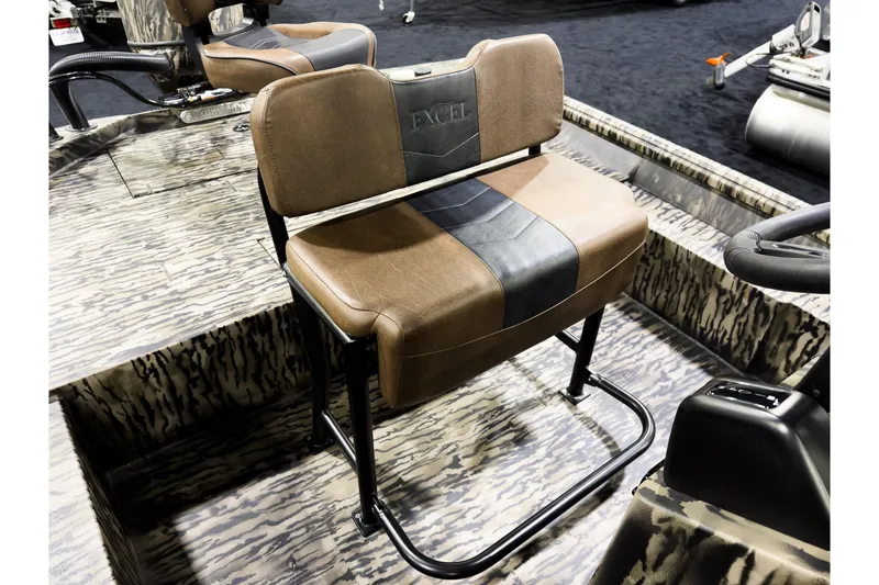 Slide: The Image of 2026 Excel 216 Stalker Center Console boat seat with camo pattern and brown upholstery. - 8