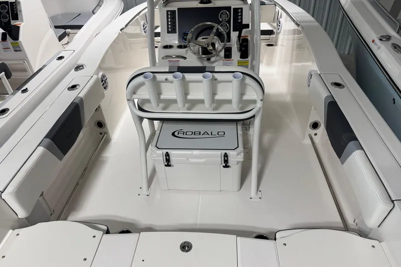 Slide: The Image of 2026 Robalo R200 Center Console boat interior with steering wheel and seating. - 15