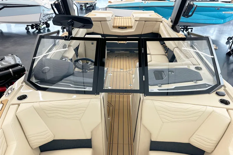 Slide: The Image of 2025 Nautique Super Air Nautique G23 Paragon interior with luxurious seating and modern design. - 6