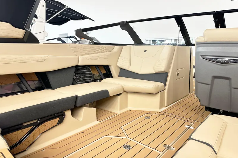 Slide: The Image of Luxurious interior of 2025 Nautique Super Air Nautique G23 Paragon boat, featuring premium seating. - 9