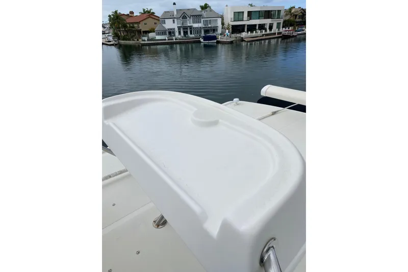 Slide: The Image of 2012 Mikelson 43 Sportfisher boat deck with waterfront view. - 15