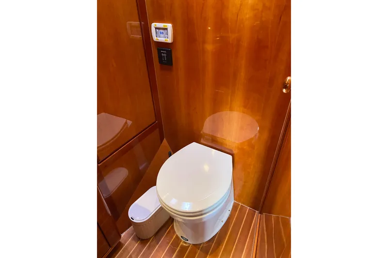 Slide: The Image of Luxury wooden bathroom interior on 2012 Mikelson 43 Sportfisher yacht. - 36