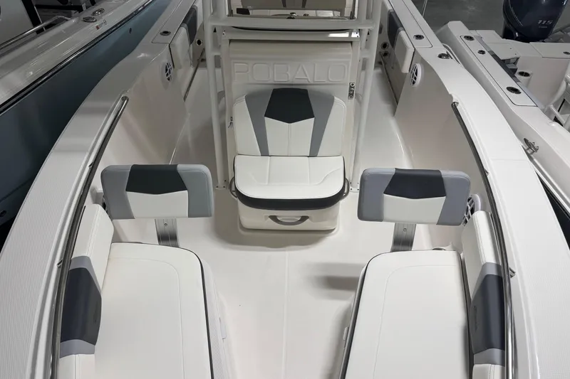 Slide: The Image of 2026 Robalo R200 Center Console boat interior with stylish seating and modern design. - 14