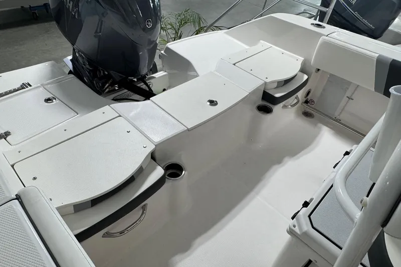 Slide: The Image of 2026 Robalo R200 Center Console boat interior with Yamaha engine, featuring spacious seating and storage. - 5