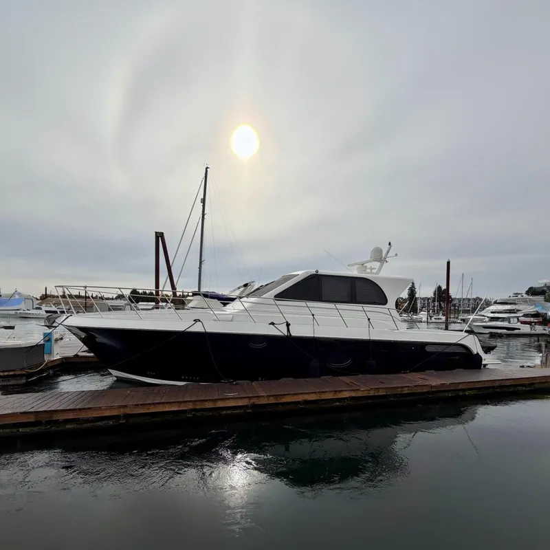 The Image of 2009 Navigator California 50 Veneti yacht docked under a cloudy sky. - 0