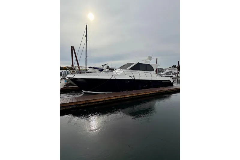 Slide: The Image of Navigator California 50 Veneti 2009 yacht docked at marina under cloudy sky. - 14
