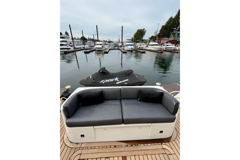 Slide: The Image of Luxury yacht deck with seating, overlooking marina; Navigator California 50 Veneti, 2009 model. - 16