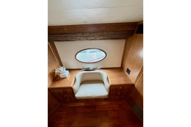 Slide: The Image of Luxurious interior of 2009 Navigator California 50 Veneti yacht with elegant seating and wood finish. - 27