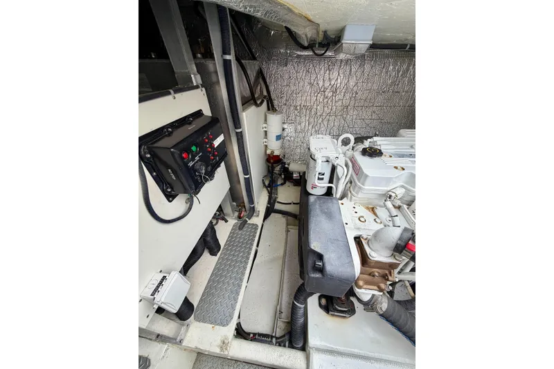 Slide: The Image of Engine room of 2009 Navigator California 50 Veneti yacht, showcasing mechanical components. - 34