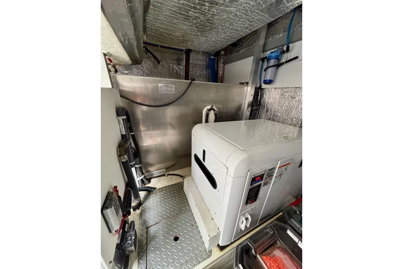 Slide: The Image of Engine room of 2009 Navigator California 50 Veneti yacht with equipment and insulation. - 35